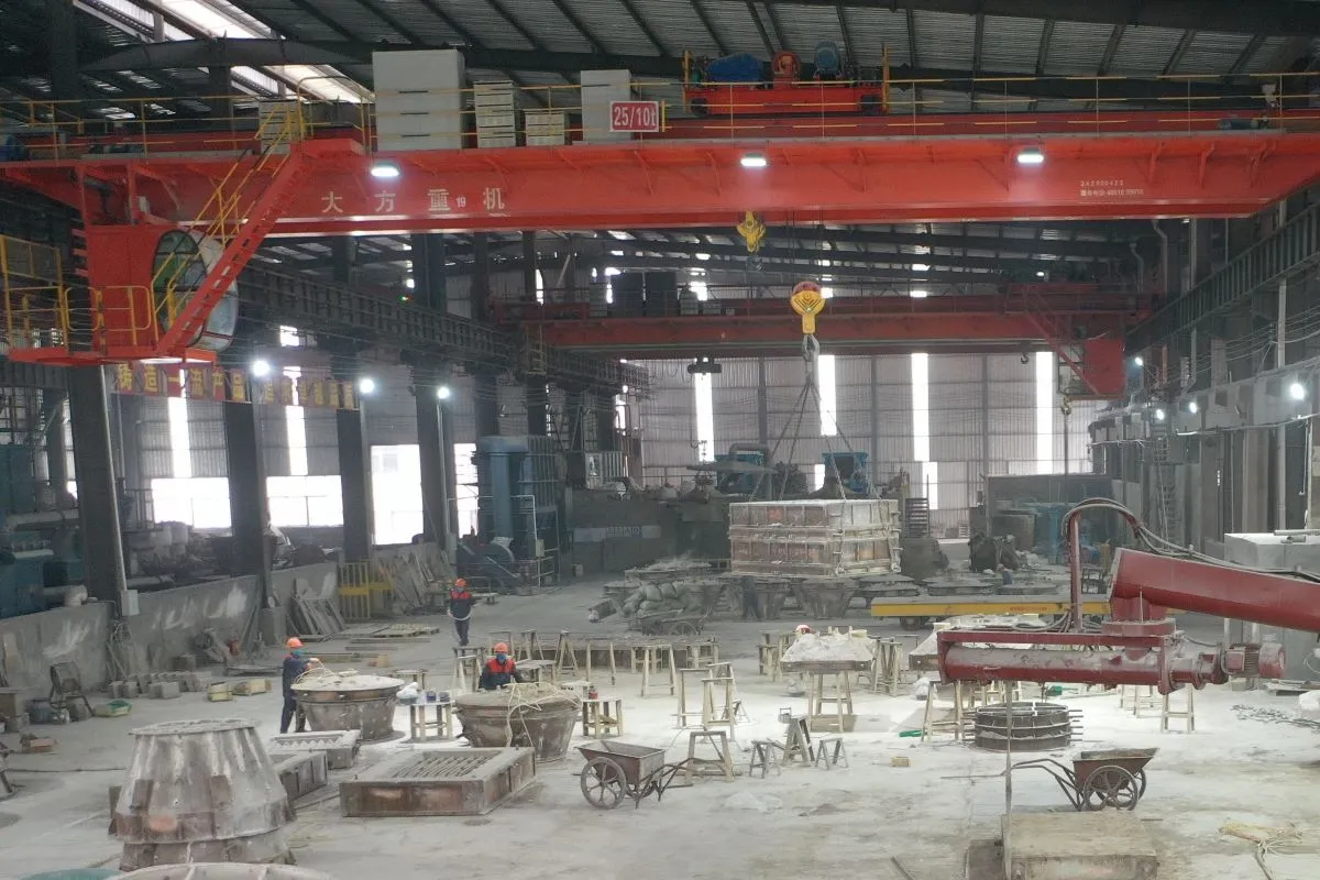 Heavy-duty overhead crane in Duma workshop for handling cone crusher wear parts Heavy-duty overhead crane in Duma workshop for handling cone crusher wear parts